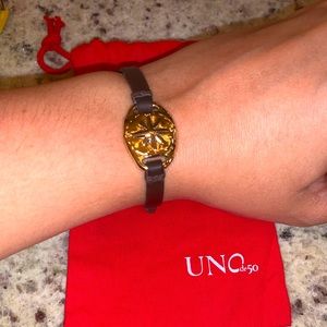 UNOde50 gold and leather bracelet